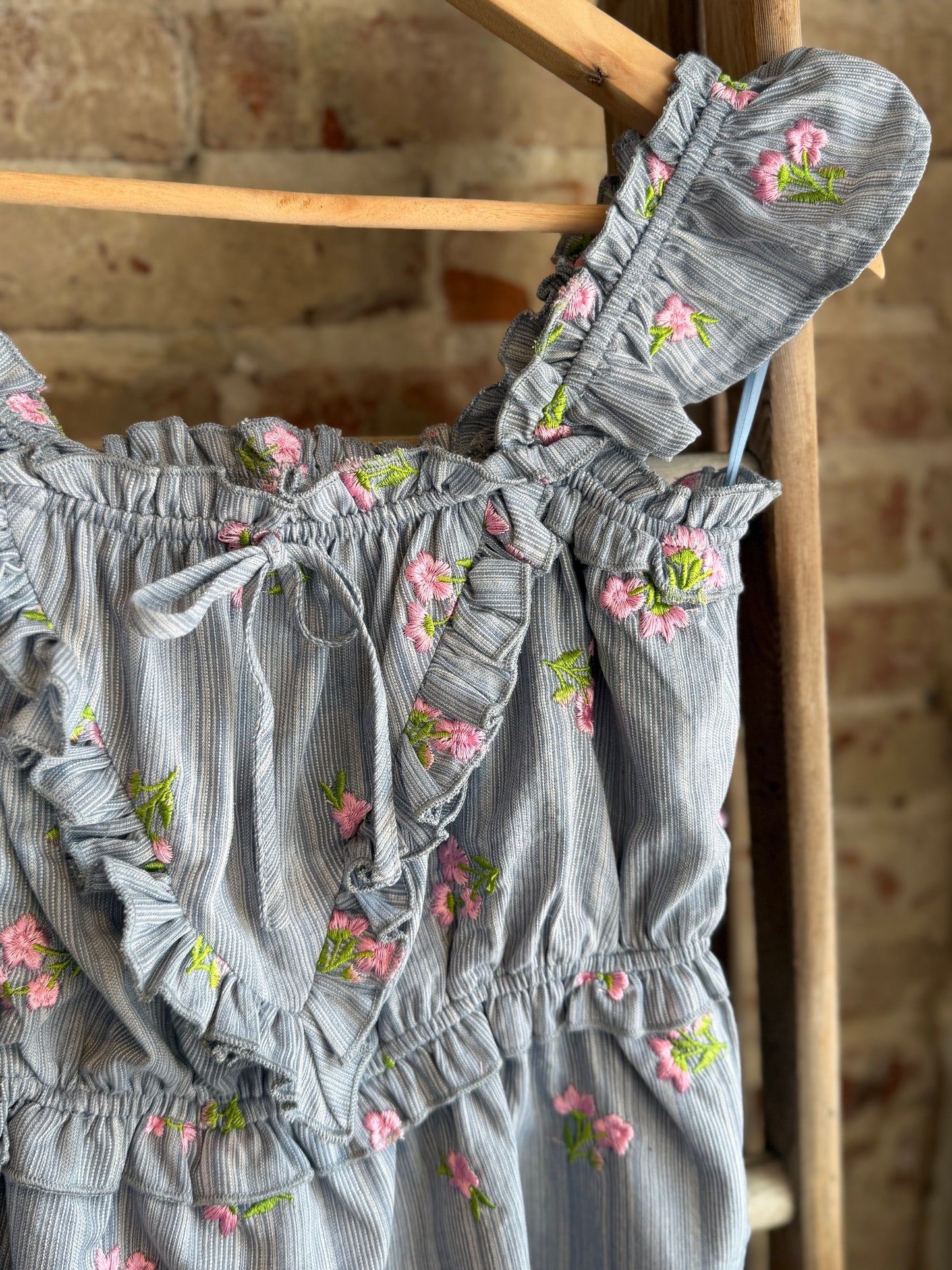 Dainty Floral Embroidered Peplum Top